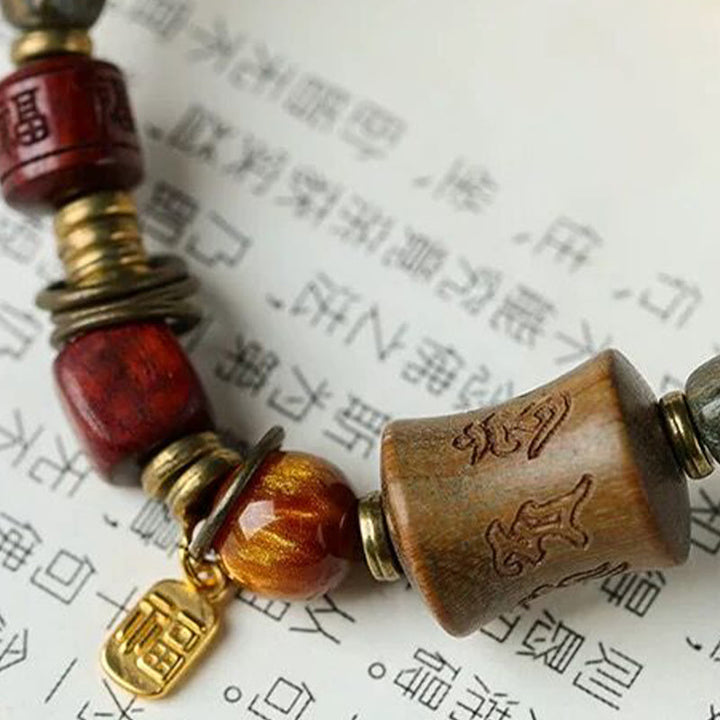 Buddha Stones, grünes Sandelholz, Ebenholz, Om Mani Padme Hum, graviertes Friedens-Dreifach-Wickelarmband