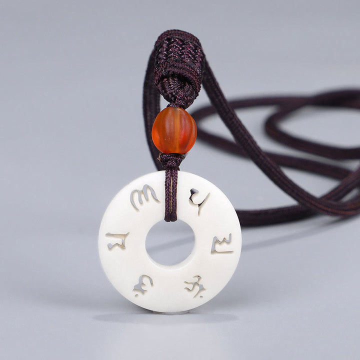 Buddha Stones, Elfenbeinfrucht, Om Mani Padme Hum, gravierter Schutz-Halskettenanhänger