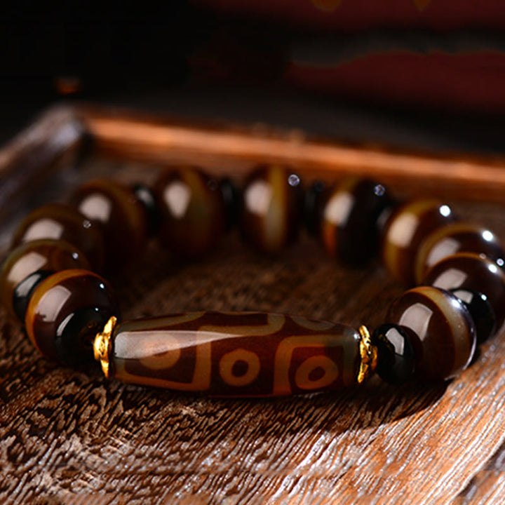 Buddha Stones Tibetisches natürliches Neun-Augen-Dzi-Perlen-Achat-Armband für Reichtum und Segen