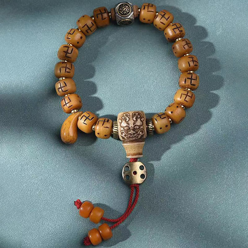 Buddha Stones, natürliches tibetisches Kamelknochen-Hakenkreuz-Dzi-Perle, Shankha-Buddha-Charm, Kirtimukha-Glücksschutz-Quastenarmband