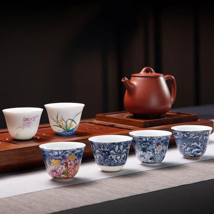 Buddha Stones, bunte Blumen, Orchidee, Meereswellen, blaue und Weiß Porzellan-Keramik-Teetasse, Kung-Fu-Teetasse