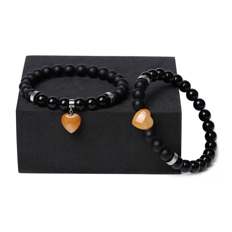 Buddha Stones 2-teiliges schwarzes Onyx-Kristall-Stein-Liebes-Herz-Schutz-Unterstützungs-Paar-Armband