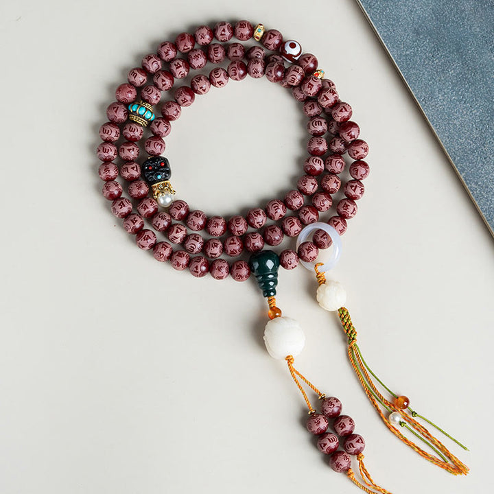 Buddha Stones, roter Bodhi-Samen, Om Mani Padme Hum Lotus, graviertes Harmonie-Armband