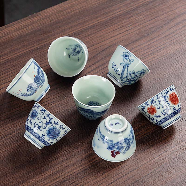 Buddha Stones, blaue Landschaft, Berge, Lotus, niedliche Katzenpavillons, Magnolien, Schilfreiher, Keramik-Teetasse, kleine Kung-Fu-Teetasse