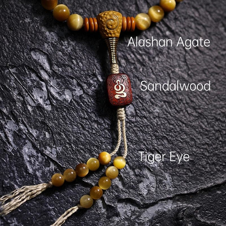 Buddha Stones 108 Mala Perlen Natürliches Tigerauge Kupfer Dorje Schutz Quastenarmband