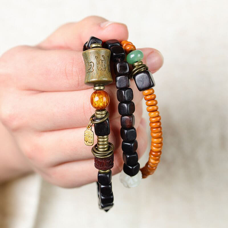 Buddha Stones, grünes Sandelholz, Ebenholz, Om Mani Padme Hum, graviertes Friedens-Dreifach-Wickelarmband