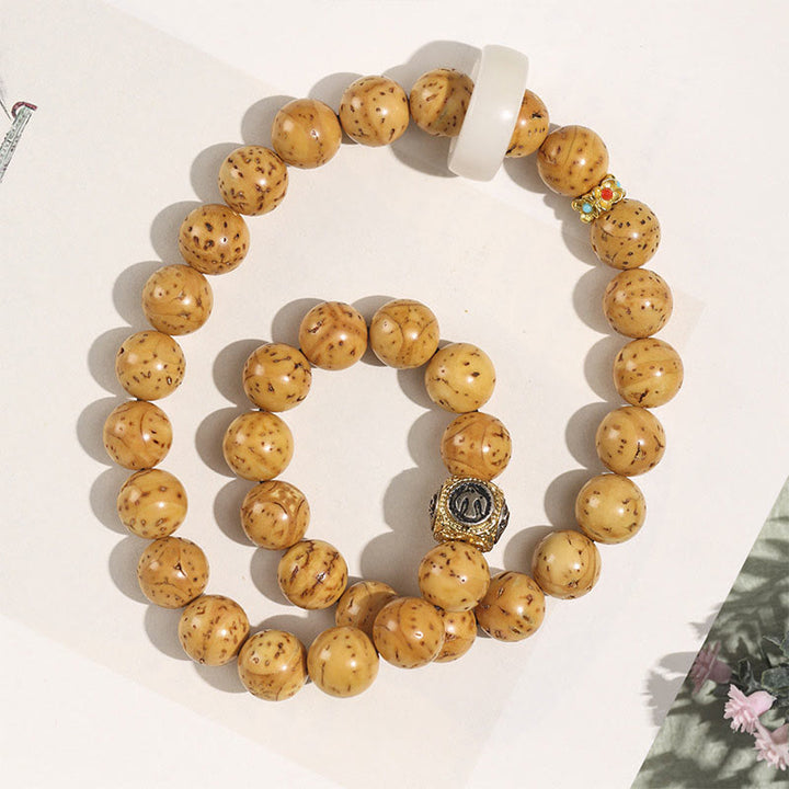 Buddha Stones, tibetisches Natur-Lila-Gold-Ratten-Bodhi-Samen-Reichtum, doppelt gewickeltes Armband