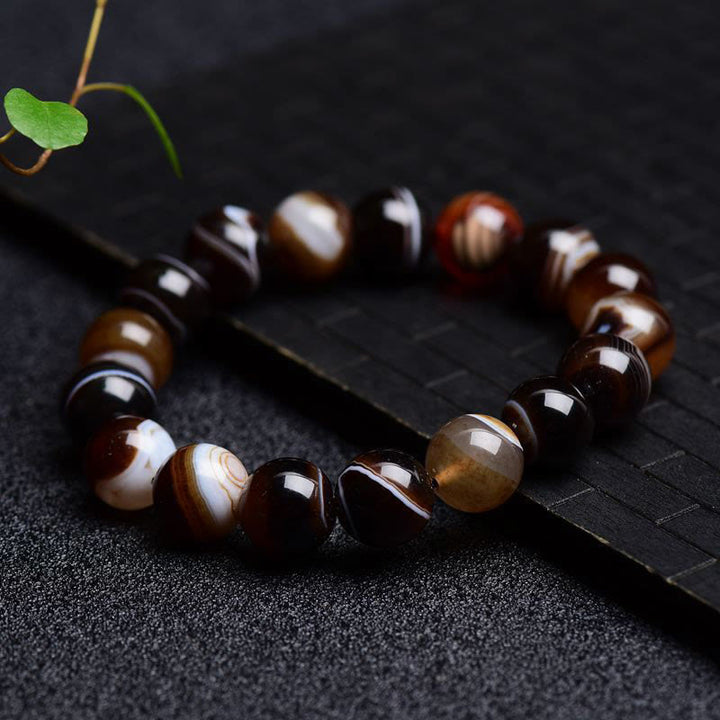 Tibetisches Sardonyx-Happiness-Positive-Armband mit Buddha Stonesn