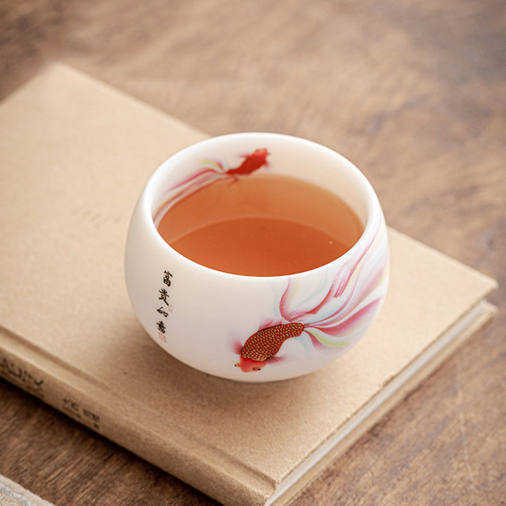 Buddha Stones Koi Fisch Weiß Porzellan-Keramik-Teetasse Kung-Fu-Teetasse