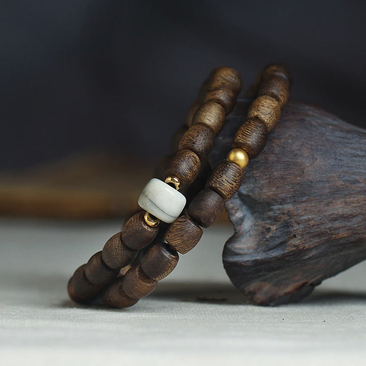 Buddha Stones, 999 Gold, seltenes Tarakan-Agarholz, tibetischer alter Geist, Knochenbalance, Stärke, doppelt gewickeltes Armband