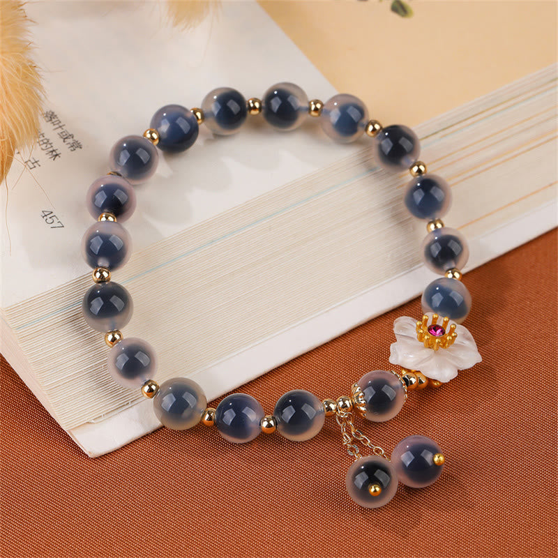 Buddha Stones natürliches blaues Bonbon-Achat-Kirschblüten-Armband mit heilender Stärke