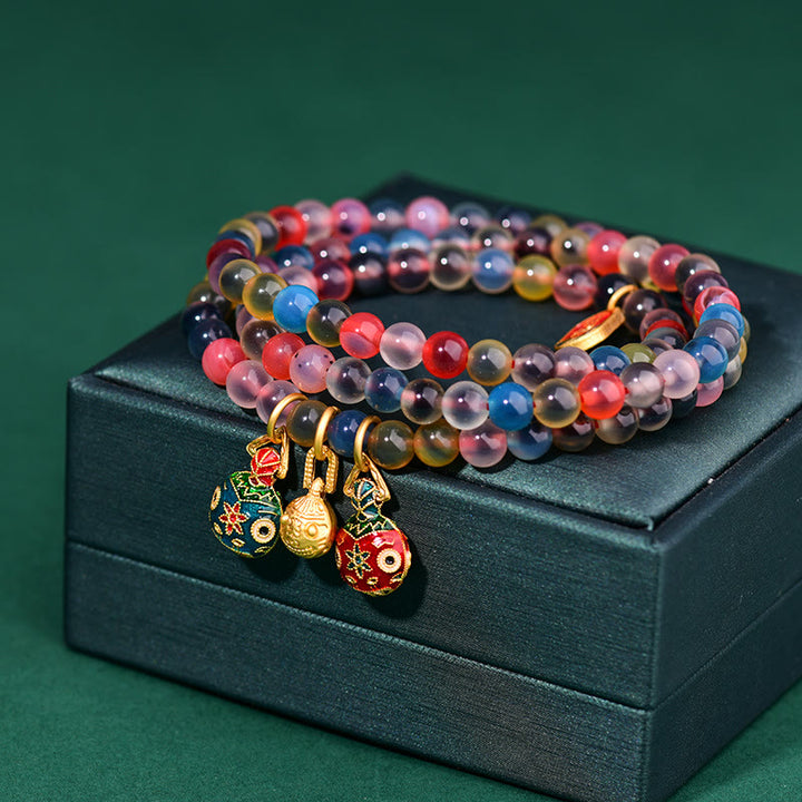 Dreifach gewickeltes Armband mit Buddha Stonesn, buntem Bonbon-Achat und Gold, schluckendes Tier, Familienstärke, Charm