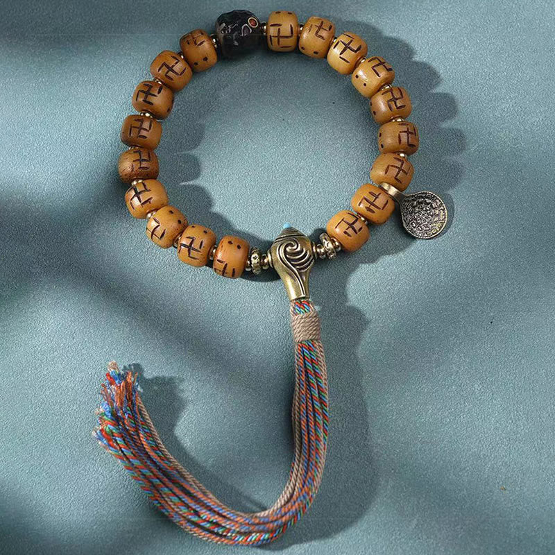 Buddha Stones, natürliches tibetisches Kamelknochen-Hakenkreuz-Dzi-Perle, Shankha-Buddha-Charm, Kirtimukha-Glücksschutz-Quastenarmband