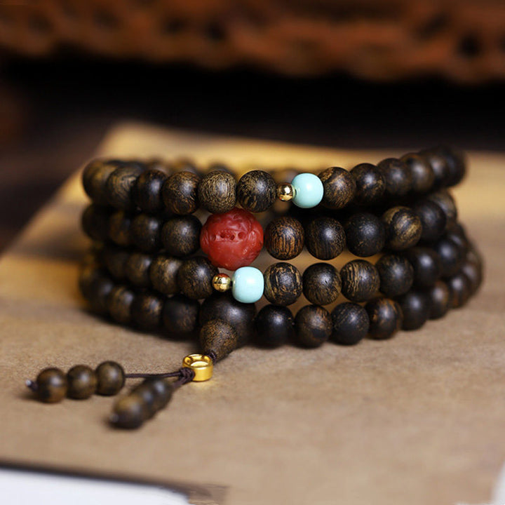 Buddha Stones 108 Mala Perlen Adlerholz Roter Achat Türkis Friedensmeditationsarmband