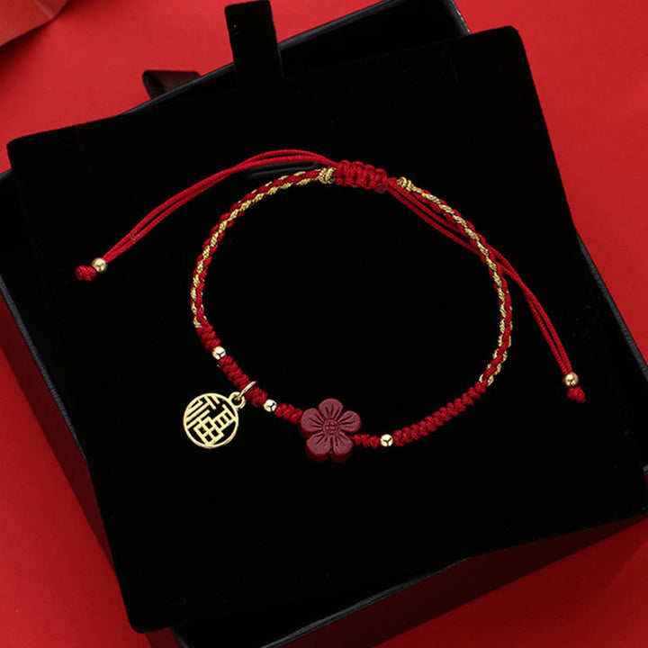 Buddha Stones Cinnabar Flower Fu Charakter Segen geflochtenes Schnurarmband