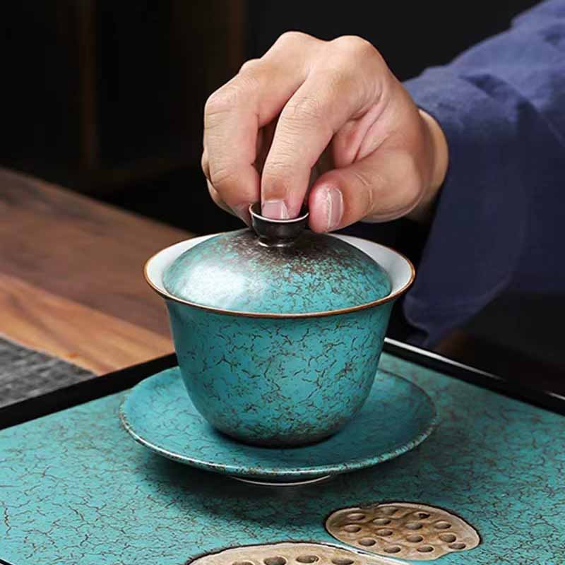 Buddha Stones Traditionelle Kiefernbaum grüne Keramik Gaiwan Sancai Teetasse Kung Fu Teetasse und Untertasse mit Deckel