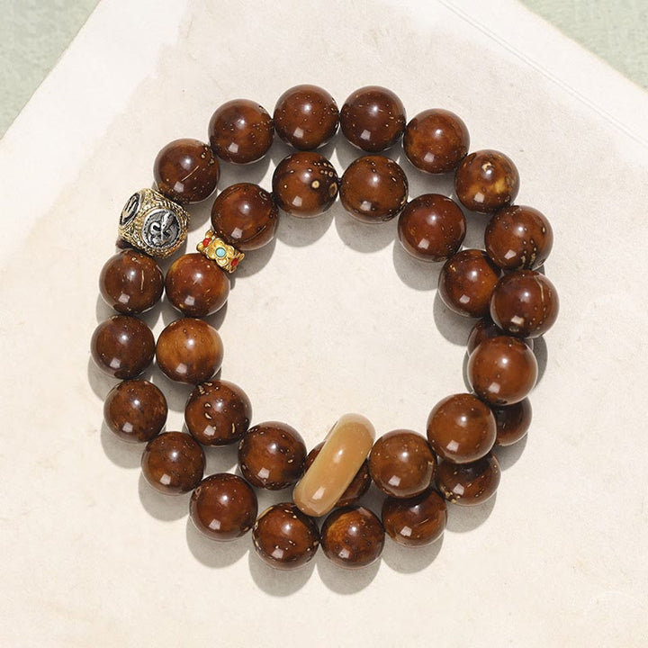 Buddha Stones, tibetisches Natur-Lila-Gold-Ratten-Bodhi-Samen-Reichtum, doppelt gewickeltes Armband