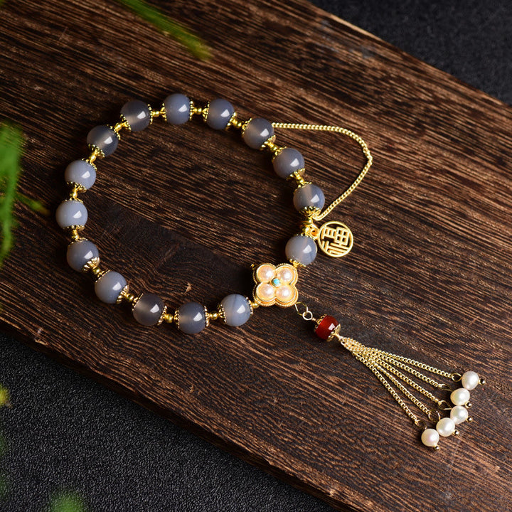 Buddha Stones natürliches graues Achat-Fu-Charakter-Perlen-Quasten-Balance-Armband