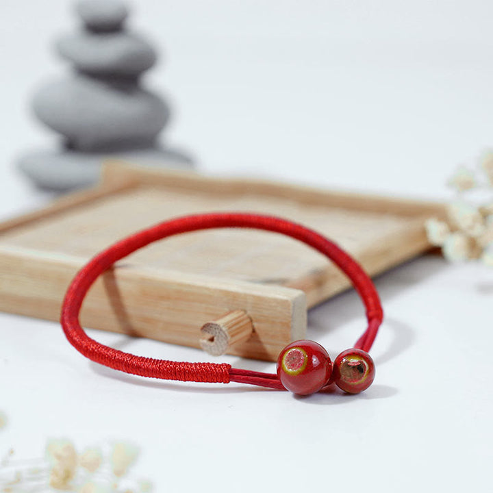 Buddha Stones FengShui Lucky Red String Keramikarmband