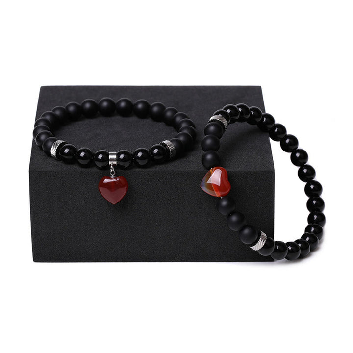 Buddha Stones 2-teiliges schwarzes Onyx-Kristall-Stein-Liebes-Herz-Schutz-Unterstützungs-Paar-Armband