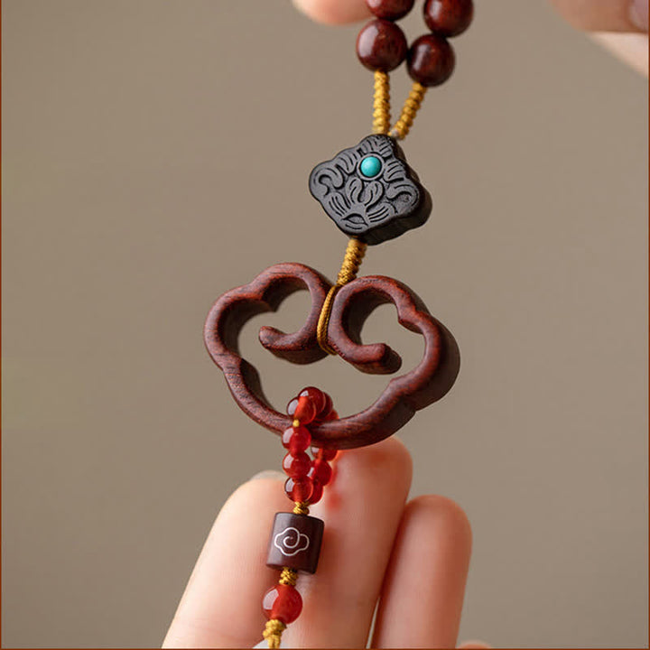 Buddha Stones, tibetisches kleines Blatt, rotes Sandelholz, Ebenholz, Friedensschloss, Glücksschutz, Auto-Hängedekoration