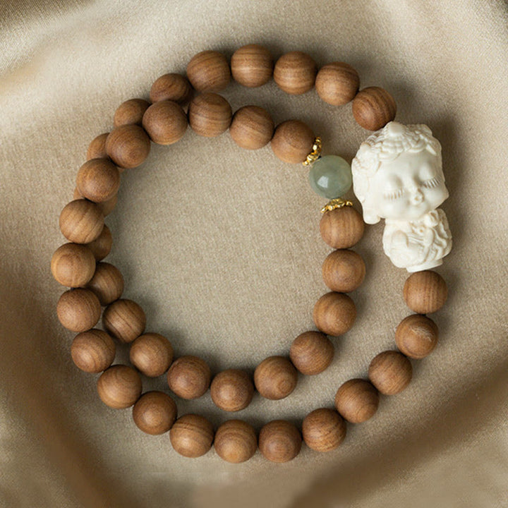 Buddha Stones, Sandelholz, Hetian-Jade, Elfenbein, Frucht, grünes Tara-Schutzarmband