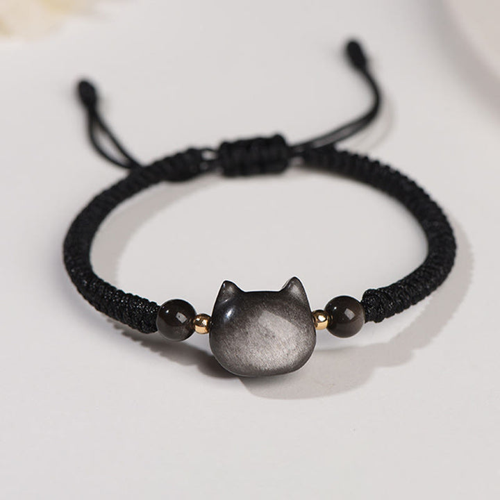 Buddha Stones Handgefertigtes, natürliches, silberglänzendes Obsidian-Erdbeerquarz-Armband mit niedlichem Katzenschutz