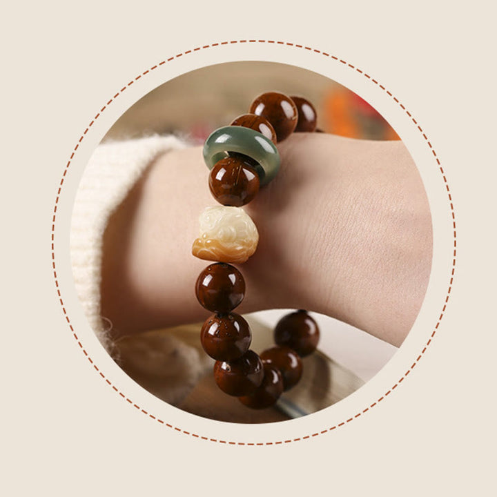 Armband mit Buddha Stonesn, lila Bodhi-Samen, tanzender Löwe, Weisheit