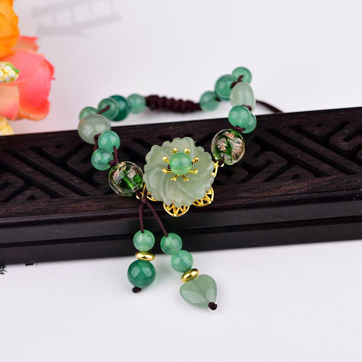 Buddha Stones natürliches grünes Jade-Glücks-Armband mit baumelnder Blume