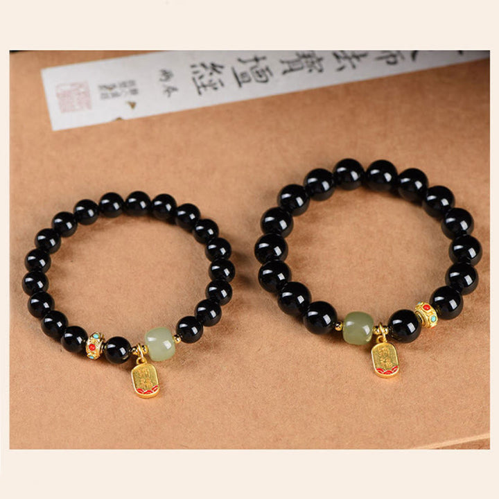 Buddha Stones, schwarzer Onyx, Hetian-Jade-Perlen, Glücksbringer-Charm-Armband