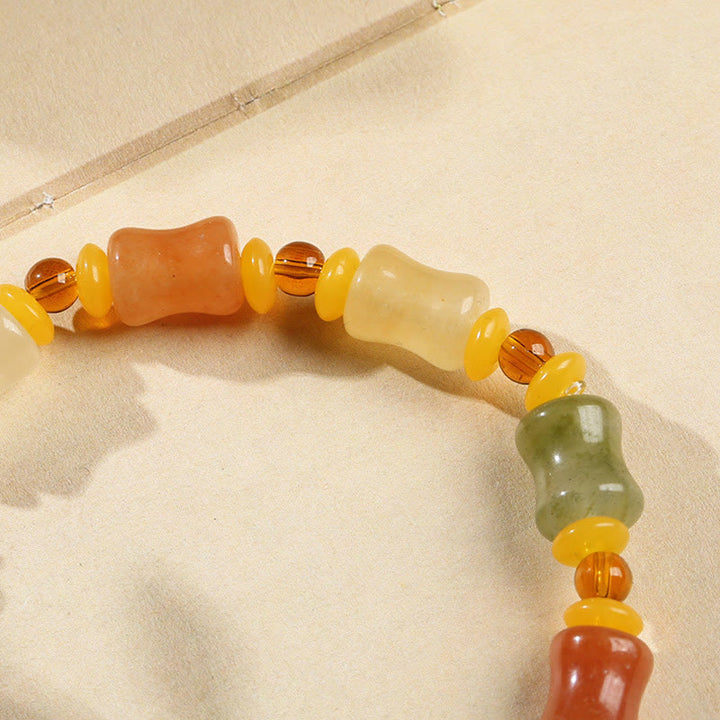 Natürliches goldenes Jade-Kürbis-Reichtum-Charm-Armband aus Seide