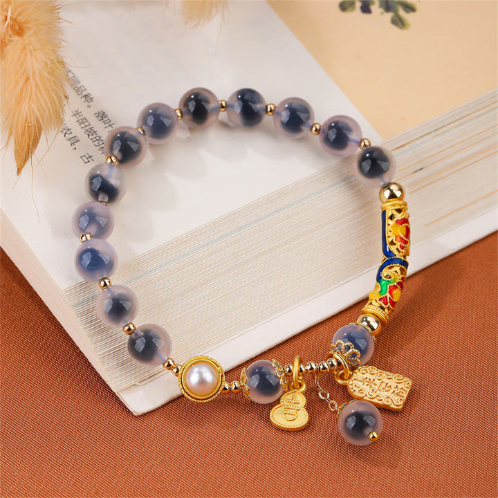 Buddha Stones Natürliches blaues Candy-Achat-Amulett-Stärke-Armband