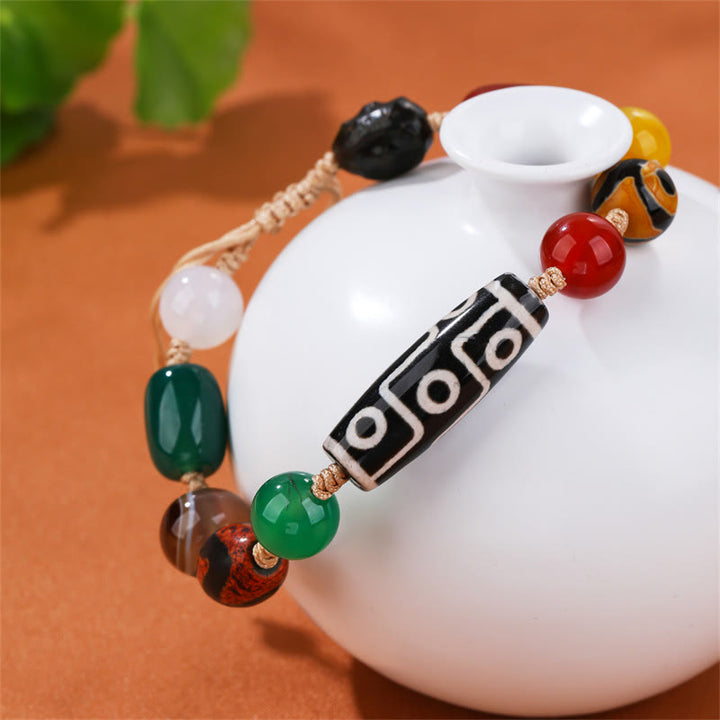 Buddha Stones Tibetisches Neun-Augen-Dzi-Perlen-Achat-Wohlstandsschutz-Armband