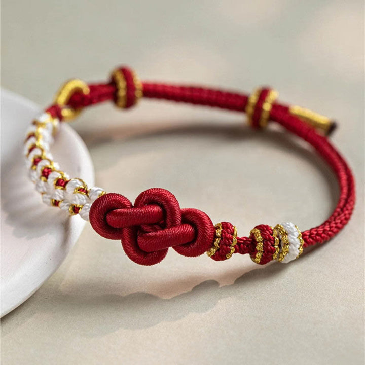 Buddha Stones Handgefertigtes Armband mit Knoten-Pfirsichblüten-Charm und Glücksseil