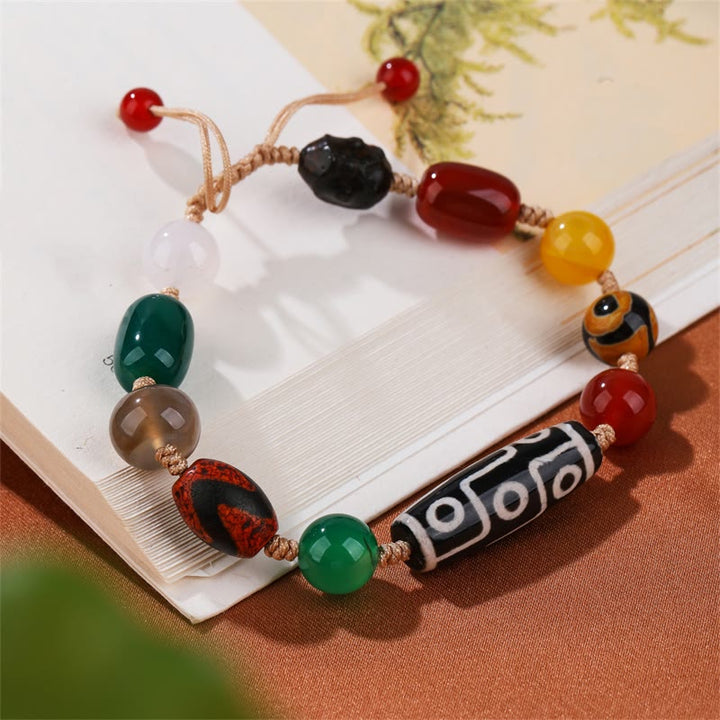 Buddha Stones Tibetisches Neun-Augen-Dzi-Perlen-Achat-Wohlstandsschutz-Armband