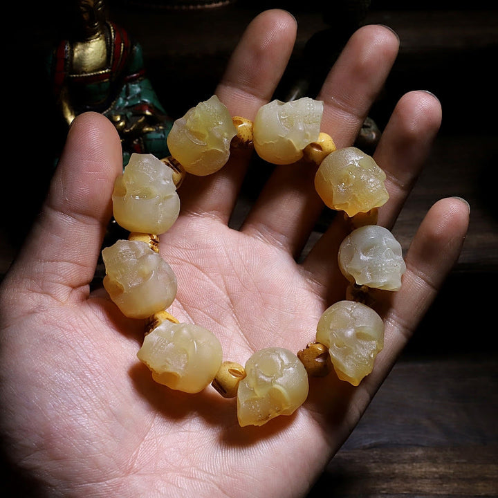 Buddha Stones Handgefertigtes Glücksarmband mit tibetischem Schafhornschädel, dem Herrn des Leichenwaldes, Yakknochen, graviert