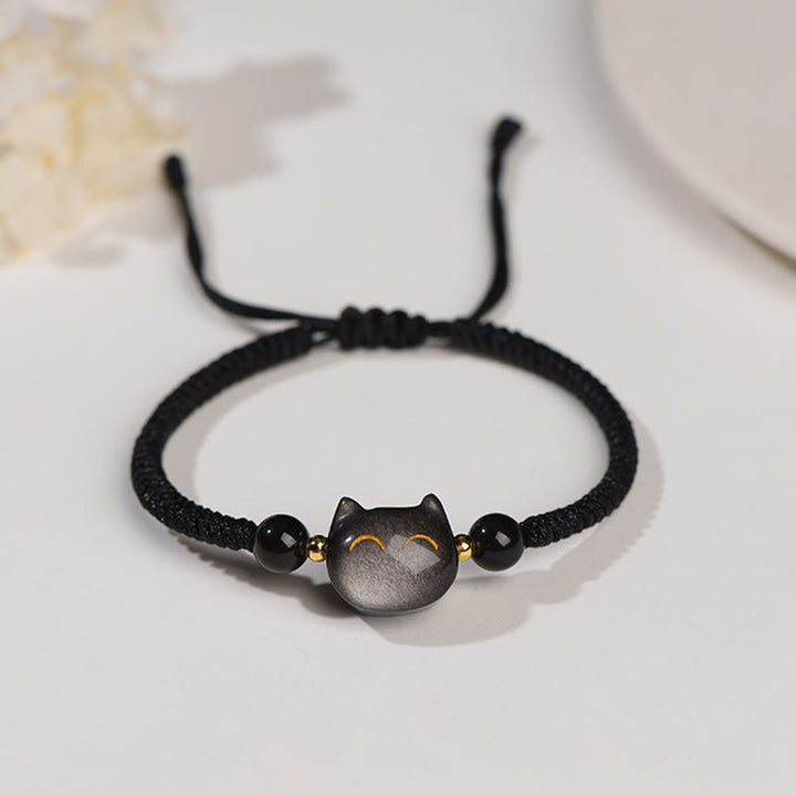 Buddha Stones Handgefertigtes, natürliches, silberglänzendes Obsidian-Erdbeerquarz-Armband mit niedlichem Katzenschutz