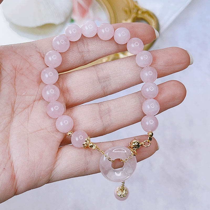 Buddha Stones natürliches rosa Kristall-Friedensschnalle-Liebes-Charm-Armband