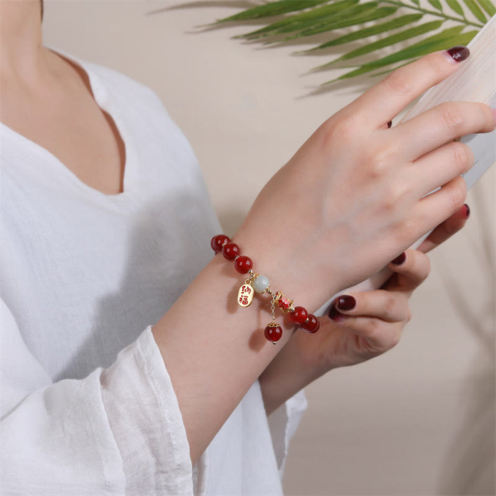 Natürliches rotes Achat-Jade-Charme-Armband mit Glückssegen-Zuversicht