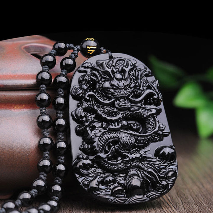 Halskette mit Anhänger „Drachenerfüllung“ aus schwarzem Obsidianstein von Buddha Stones