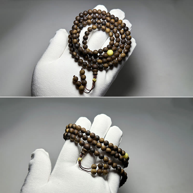 Buddha Stones 999 Gold Tarakan 108 Mala Perlen Adlerholz Bernstein Armband zur Abwehr böser Geister