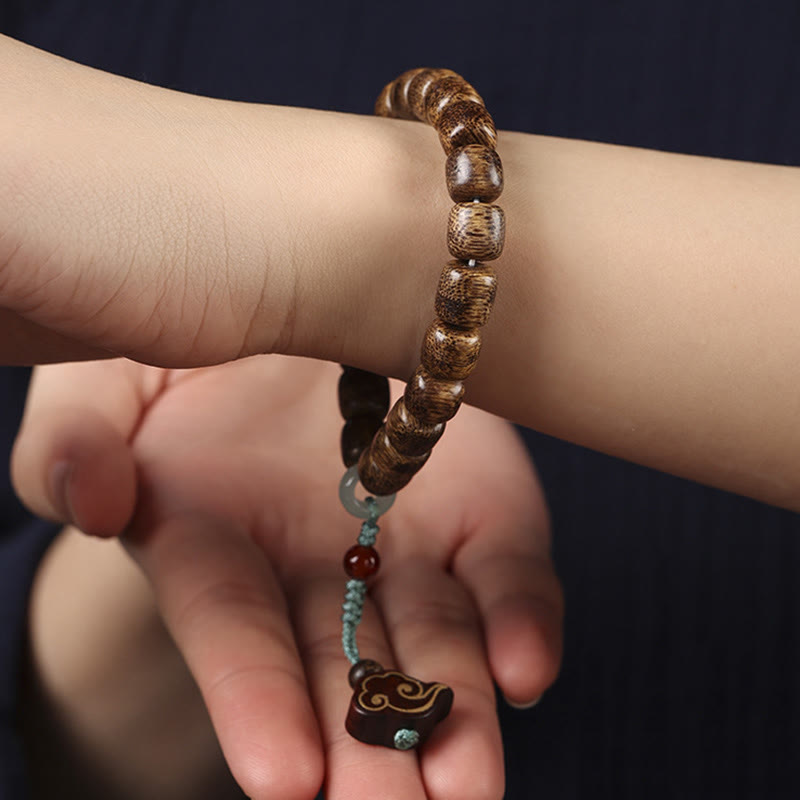 Armband mit Buddha Stonesn, Agarholz, Kupfermünze, verheißungsvolle Wolke, Ruhe