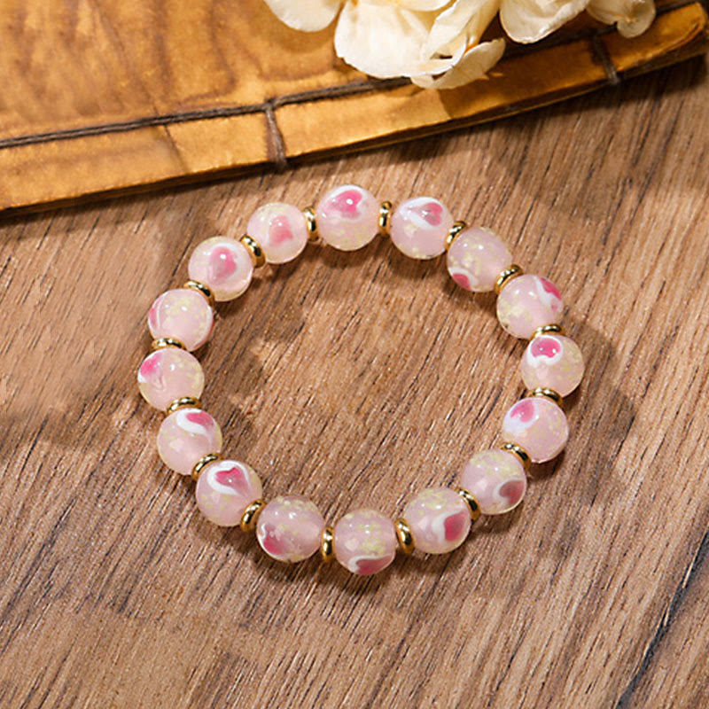Buddha Stones Gold Schluckendes Biest Familien-Charm, leuchtendes rosa Liebesherz, fluoreszierendes Liuli-Glasperlen-Segens-Armband