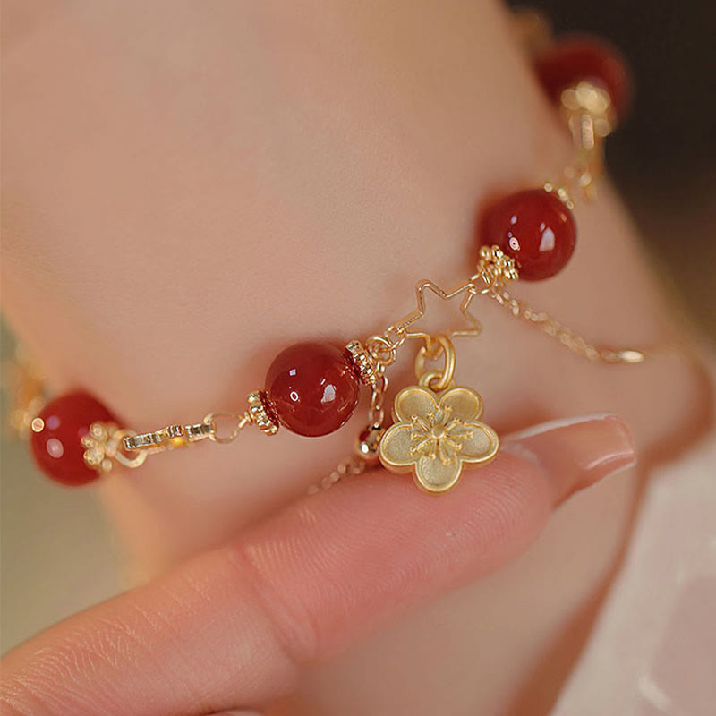 Buddha Stones 14 Karat vergoldetes rotes Achat-Stern-Blumen-Charm-Armband