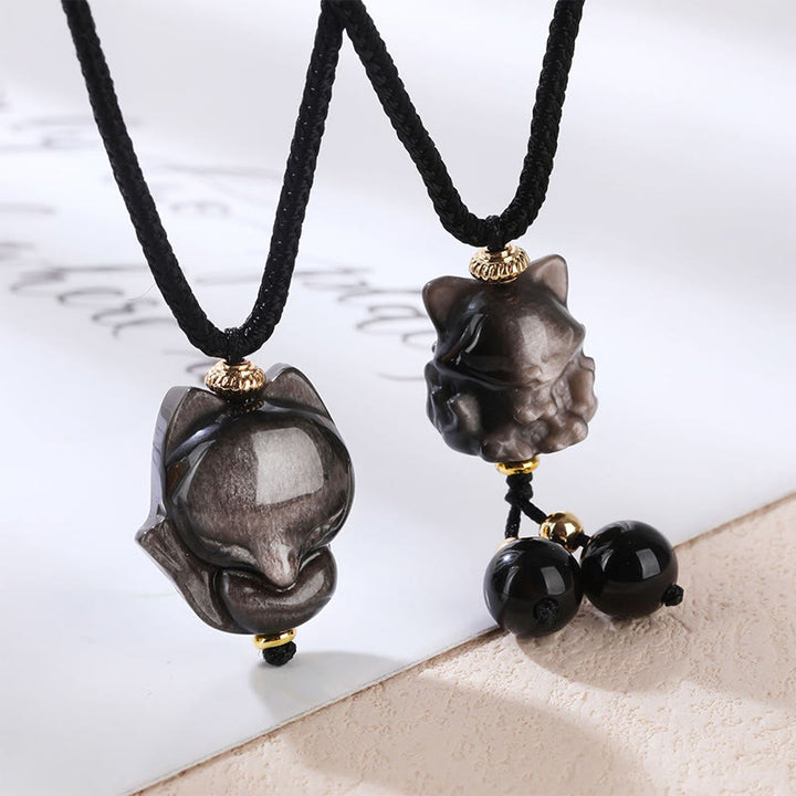 Buddha Stones Natürlicher Obsidian-Halskettenanhänger mit neunschwänzigem Fuchsschutz und silberfarbenem Glanz