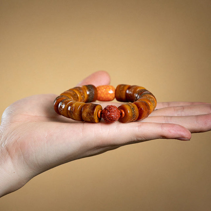 Buddha Stones Tibetisches natürliches Kamelknochen-Bernstein-Roter Achat-Türkis-Schutz-Glücksarmband