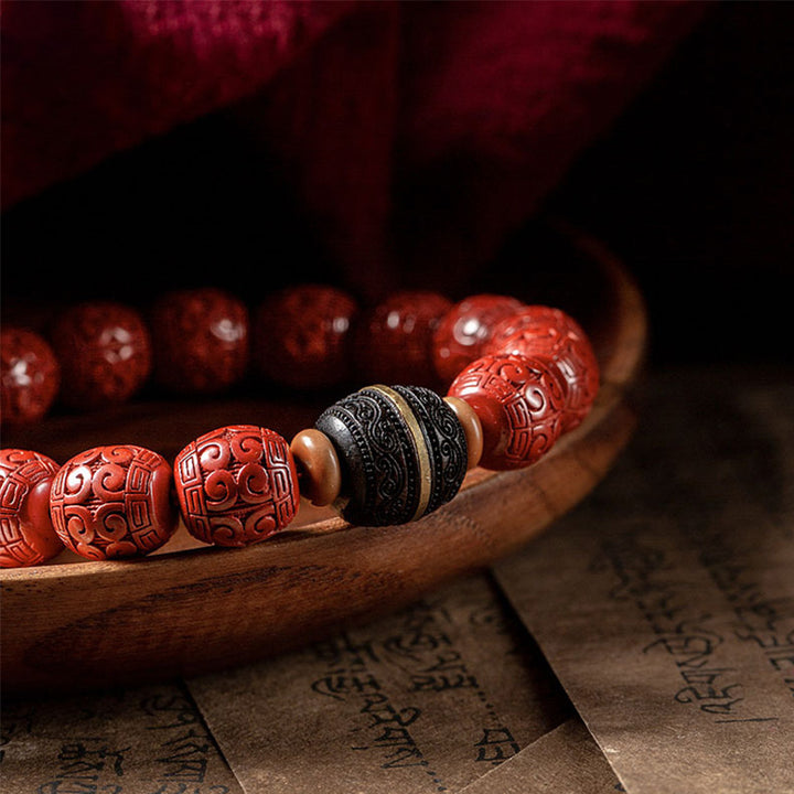 Armband „Buddha Stones“, natürliches Zinnober-Ebenholz, beruhigendes Segensarmband